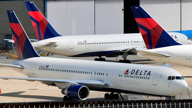 Delta Air Lines planes 2010 file Mark Lennihan/AP File Photo