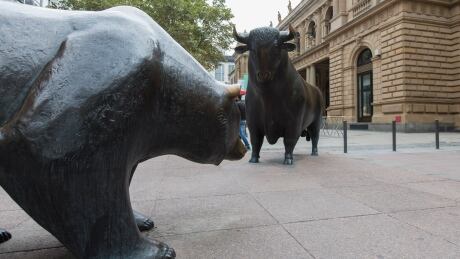 Bear and bull statues stand outside the Frankfurt Stock Exchange as Schaeffler AG make an initial public offering (IPO), in Frankfurt, Germany, on Friday, Oct. 9, 2015. Schaeffler cut the size of its planned IPO by more than half and now seeks to raise only about 975 million euros ($1.1 billion), after the auto industry was buffeted by the Volkswagen AG emissions-testing scandal. Photographer: Martin Leissl/Bloomberg bulls bears inveting frankfurt stock exchange market