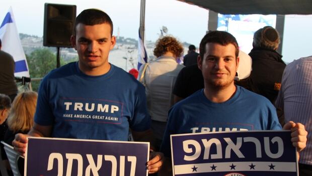 https://i.cbc.ca/1.3823632.1477571884!/fileImage/httpImage/image.JPG_gen/derivatives/16x9_620/trump-sign-in-hebrew.JPG