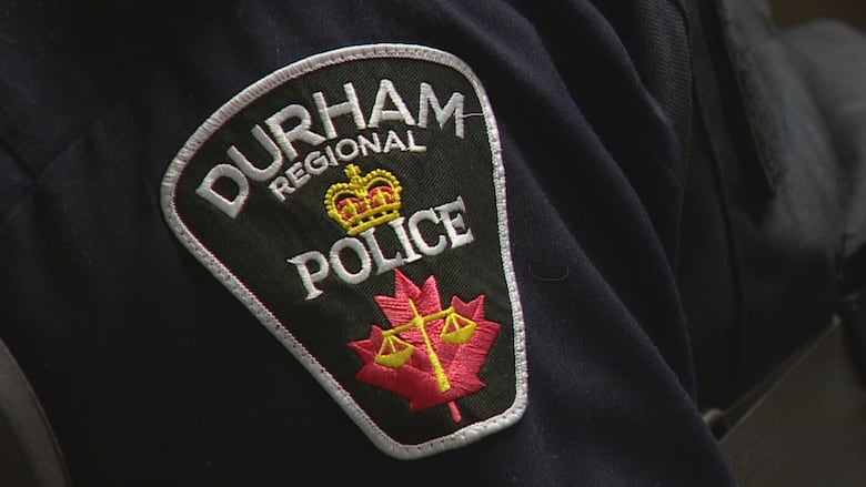 The Durham Regional Police Service logo on a uniform sleeve.