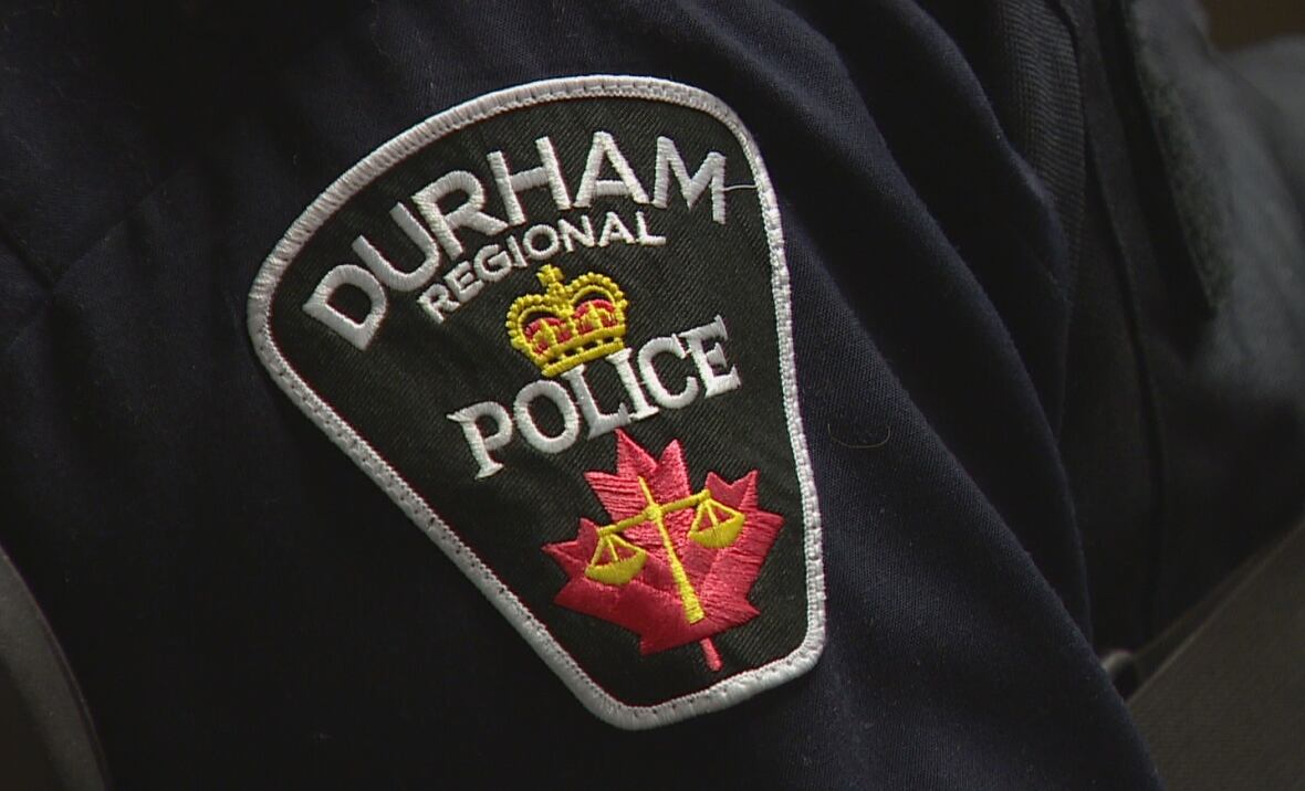 The Durham Regional Police Service logo on a uniform sleeve.