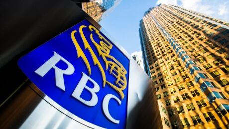 A Royal Bank of Canada (RBC) logo is seen on Bay Street in the heart of the financial district in Toronto on Jan. 22, 2015. CANADA BANKS