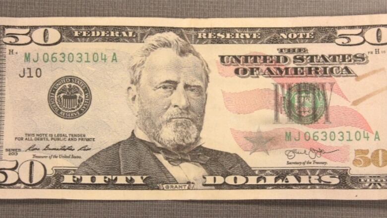 Counterfeit U.S. cash circulating in Victoria, police warn | CBC News