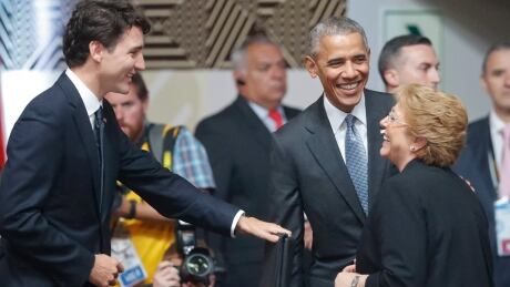 U.S. President Barack Obama, center, shares a laugh with Canada's Prime Minister Justin Trudeau, left, and Chile's President Michelle Bachelet at the opening session of the Asia-Pacific Economic Cooperation (APEC) summit in Lima, Peru, Sunday, Nov. 20, 2016. APTOPIX Obama Peru APEC Summit