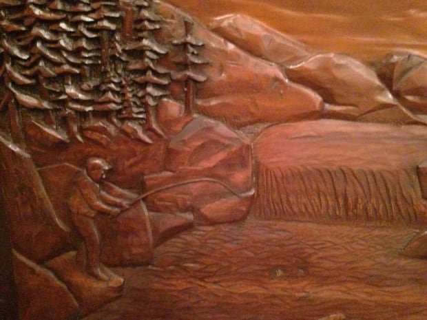 wooden mural returned