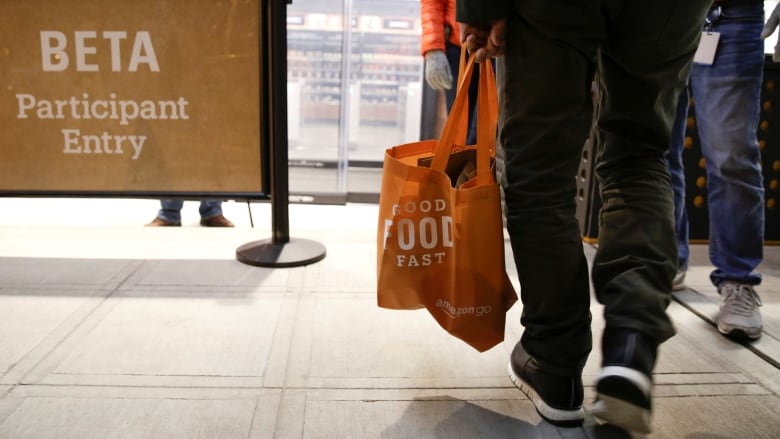 Amazon opens Go, a real life grocery store with no checkout line | CBC News