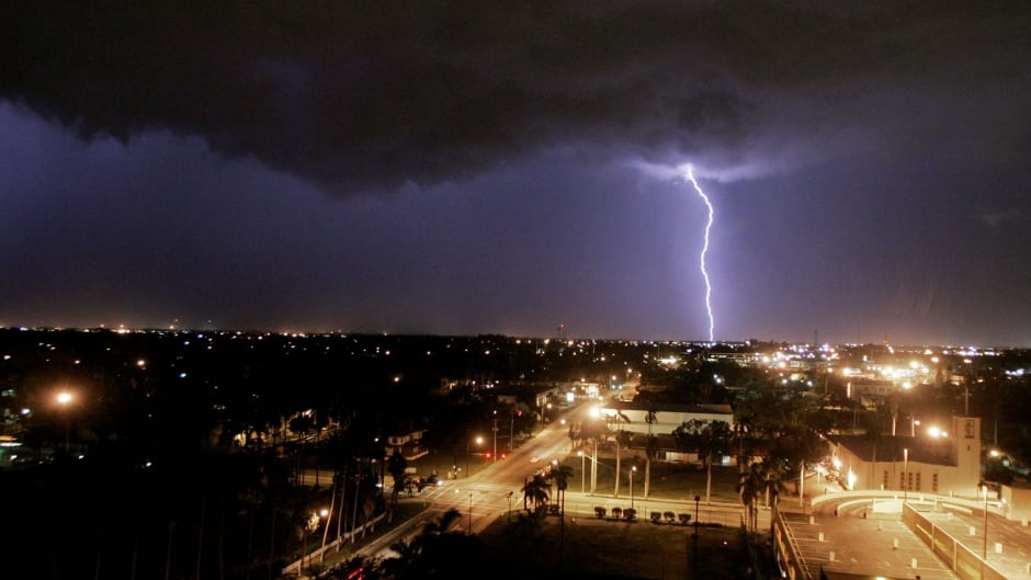 Lightning strikes the ground as a violent thunder storm approaches the area August 16, 2004 in Ft. Myers, Florida.