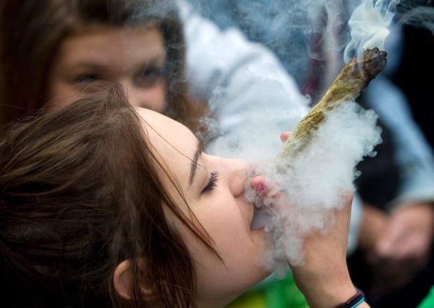 woman smoking marijuana