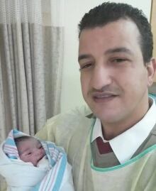 Mohamed Al Abdallah with baby