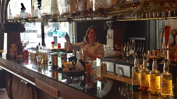 Co-owner Julie Shore tends mid day bar at the Halifax Distillery Company.
