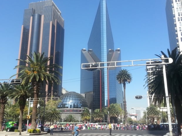 Demonstrators pass Mexican Stock exchange