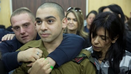 Israeli soldier Elor Azaria, who is charged with manslaughter by the Israeli military, sits to hear his verdict in a military court in Tel Aviv, Israel, January 4, 2017. ISRAEL-PALESTINIANS/SOLDIER-VERDICT