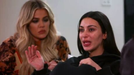 Kim Kardashian, right, is seen crying as she recounts being held at gunpoint and robbed in Paris in promo footage released in January 2017 for the upcoming season of her reality show Keeping Up With the Kardashians. Kim Kardashian