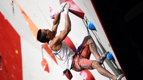 Canada's Sean Mccoll competes during the qualification men lead round at the indoor World Climbing and Paraclimbing Championships 2016, on September 15, 2016, at the Accor Hotels Arena in Paris. / AFP / MIGUEL MEDINA (Photo credit should read MIGUEL MEDINA/AFP/Getty Images) mccoll-sean-160915-1180