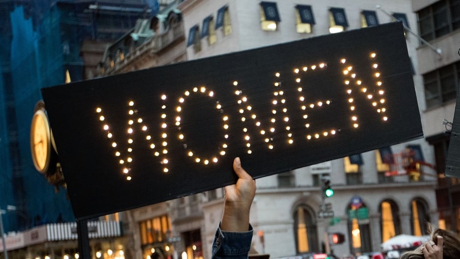 Protesters rally against Donald Trump outside of Trump Tower, November 3, 2016 in New York City.