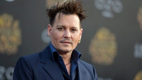 FILE - In this May 23, 2016 file photo, Johnny Depp arrives at the premiere of "Alice Through the Looking Glass" at the El Capitan Theatre, in Los Angeles. Johnny Depp is suing his former business managers alleging they mismanaged his earnings throughout his career, although the company says the actor’s spending is to blame. Depp’s lawsuit filed Friday, Jan. 13, 2017 in Los Angeles Superior Court against The Management Group seeks more than $25 million, alleging its owners failed to properly pay his taxes, made unauthorized loans and overpaid for security and other services, but the company’s attorney says the managers tried for years to control Depp’s spending. People-Johnny Depp