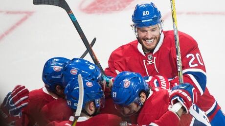 Montreal Canadiens captain Max Pacioretty (67) celebrates with teammates Zach Redmond (20), Mark Barberio (45) and Alexander Radulov (47) after scoring against the New York Rangers. rangers-canadiens