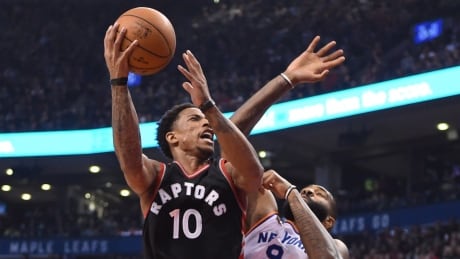 Toronto Raptors guard DeMar DeRozan drives on New York Knicks centre Kyle O'Quinn during the first half of a 116-101 win in Toronto on Sunday. derozan-demar-011517-620