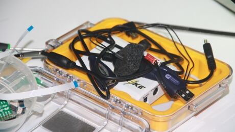 An assortment of some of the cords RCMP tech crime experts use to tap into cellphones that have been seized. RCMP tech equipment