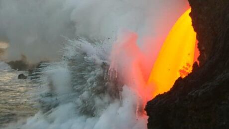 Lava spews into the ocean from the Kilauea Volcano on the Big Island of Hawaii. Kilauea Volcano