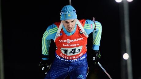 Yan Savitskiy, pictured here, finished 11th with his Kazakhstan mixed relay team at the biathlon world championships Thursday in Austria, just hours after police seized medical equipment, drugs and mobile phones in a raid of the team's lodgings on suspicion of doping. savitskiy-yan-161127-1180
