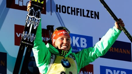 Laura Dahlmeier of Germany celebrates her victory Wednesday in the women's 15-kilometre individual competition of the IBU World Championshipsin Hochfilzen, Austria. dahlmeier-laura-170215-1180