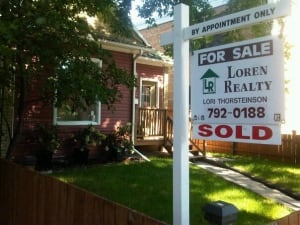 For sale sign Shan's home in Winnipeg