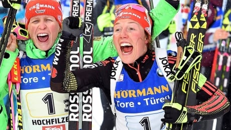 Germany's Laura Dahlmeier, right, celebrates her team's win in the women's 4x6 km relay with Maren Hammerschmid on Friday in Hochfilzen, Austria to become the first biathlete to medal in 10 consecutive world championship races. dahlmeier-laura-170217-1180