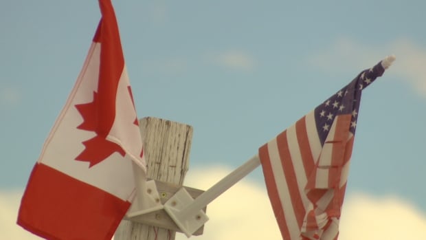 CANADIAN FLAG US FLAG