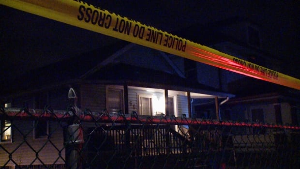Cordoned-off home on University Ave west of Louis