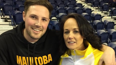 Derek Schneider, left, has been in his mother Michelle Englot's corner all week at the Scotties. Scotties Englot Schneider