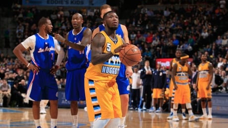 Nate Robinson, seen above as a member of the Denver Nuggets in 2014, dazzled the crowd by going through an opponent's legs while playing for the Delaware 87ers on Saturday night. robinson-nate-121914-620