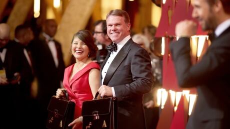 HOLLYWOOD, CA - FEBRUARY 26: (L-R) Representatives from PricewaterhouseCoopers, Martha L. Ruiz, Brian Cullinan and actor Ryan Gosling attend the 89th Annual Academy Awards at Hollywood & Highland Center on February 26, 2017 in Hollywood, California. 695550925_CP_2384_1304F9F8D551CE4CB783230E0161AACF.JPG_A