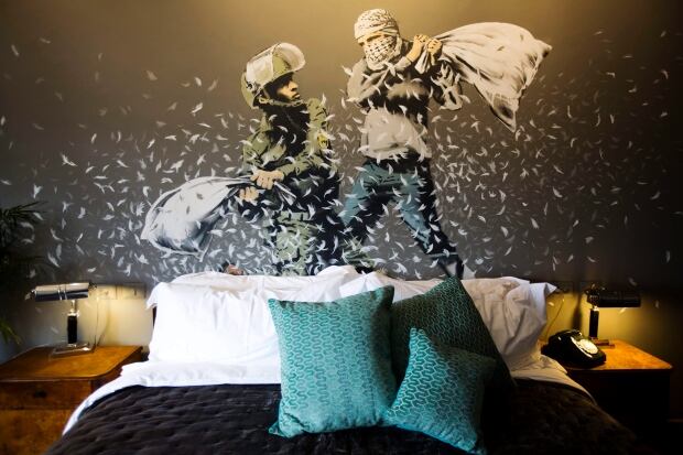 APTOPIX Palestinians Banksy