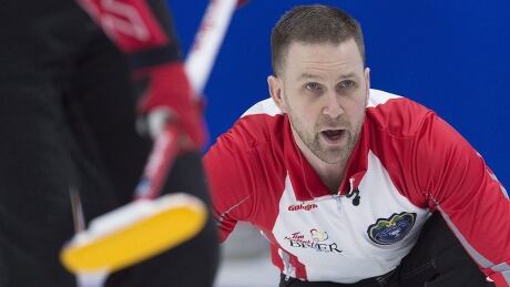 Newfoundland and Labrador skip Brad Gushue directs the sweep as they play Ontario in draw 15 action at the Tim Hortons Brier curling championship at Mile One Centre in St. John's on Thursday, March 9, 2017. THE CANADIAN PRESS/Andrew Vaughan gushue-brad-170309-1180