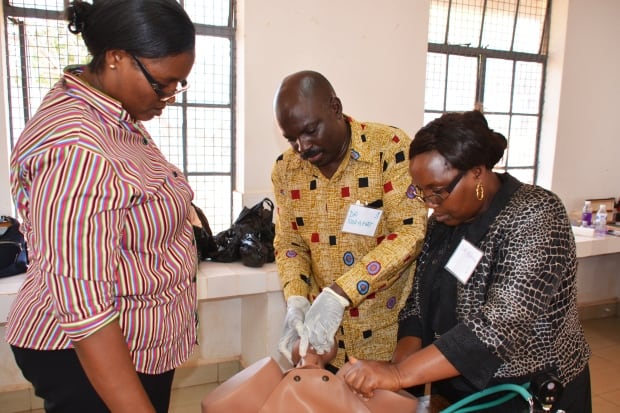 Doctor teaches obstetrical skills