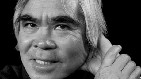 FILE - In this Tuesday, April 19, 2011 photo, Associated Press Pulitzer Prize-winning photographer Nick Ut poses for a photo in Los Angeles. Ut will be retiring from the AP in March 2017 after 51 years of taking photographs from the front lines of the Vietnam War to the red carpets of Hollywood. (AP Photo/Richard Vogel) Nick Ut Retires