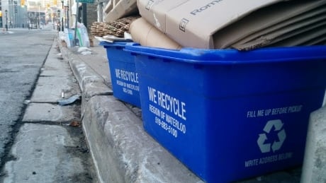 Waterloo region recycling bins are set out on the curb in downtown Kitchener. Waterloo region garbage recycle recycling bins