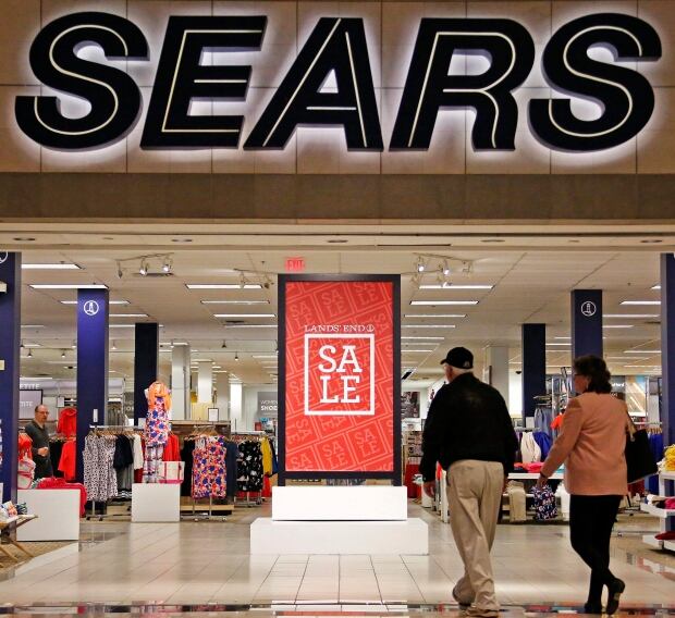 Earns Sears Holdings