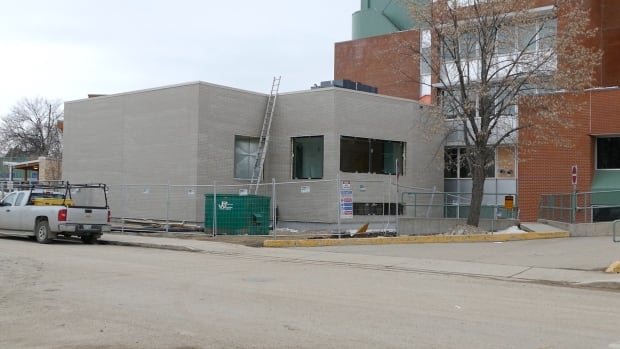 The grey addition to the Dauphin Regional Health Centre was specially built to house an MRI machine. The project is now on hold. A hospital in Dauphin is pictured.