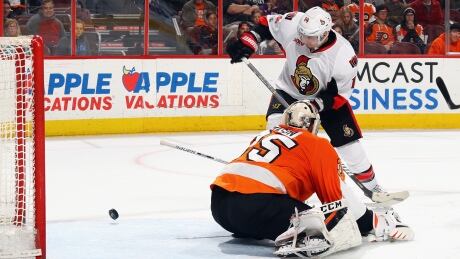 Ottawa's Alex Burrows scored past Philadelphia's Steve Mason Tuesday, but the goal was disallowed. 95132834