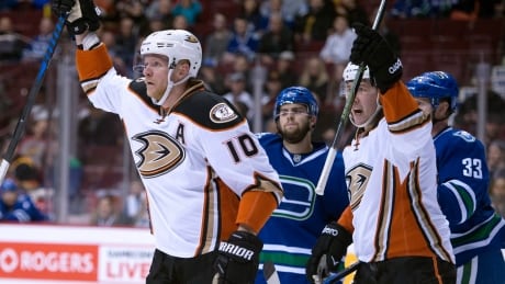 Anaheim Ducks right wing Corey Perry (10) celebrates his goal with teammate Nick Ritchie (37) during first period. ducks-canucks