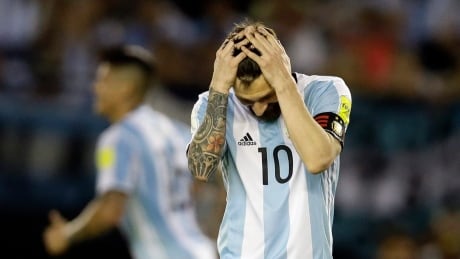 In this March 23, 2017 photo, Argentina's Lionel Messi reacts after missing a chance to score during a World Cup qualifying match against Chile in Buenos Aires, Argentina. Argentina Soccer FIFA Messi Charged