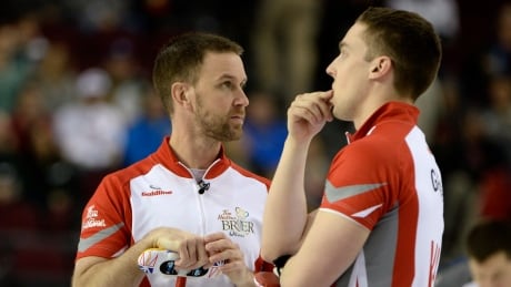 Newfoundland and Labrador skip Brad Gushue and second Brett Gallant look on during a draw against Northern Ontario in round robin competition at the Tim Hortons Brier curling championship, Friday March 11, 2016, in Ottawa. THE CANADIAN PRESS/Justin Tang CUR Brier 20160311