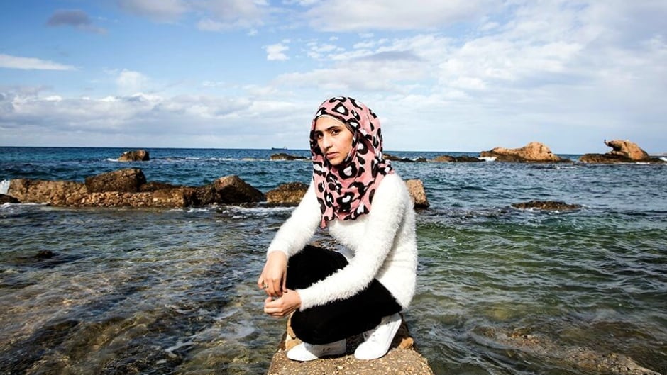 Doaa Al Zamel survived four days floating in the Mediterranean sea with the children of strangers in her arms, after the boat she was on sank.