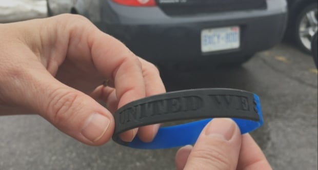 Wristband in support of OPS officer accused of manslaughter
