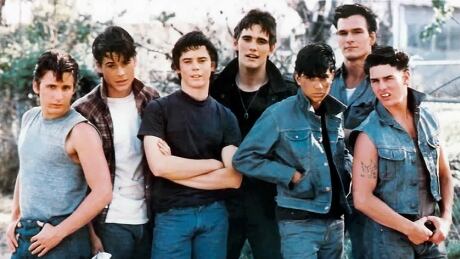 The book inspired a successful 1983 film adaptation directed by Francis Ford Coppola. It starred from left to right: Emilio Estevez, Rob Lowe, C. Thomas Howell, Matt Dillon, Ralph Macchio, Patrick Swayze, and Tom Cruise. The Outsiders film