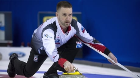 Team Canada skip Brad Gushue makes a shot during a draw against Switzerland at the Men's World Curling Championships. gushue-brad