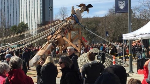 A 17-metre tall totem pole, carved from an 800-year-old cedar tree was raised at UBC on Saturday April 1, 2017 and represents the victims and survivors of Canada's residential school system.