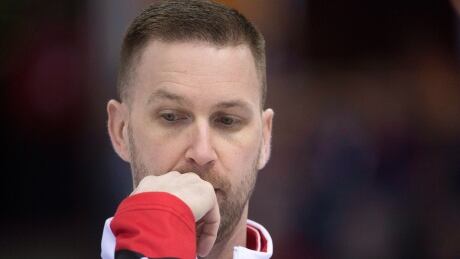 Canada skip Brad Gushue pauses for a moment during draw 3 against Russia at the men's world curling championships in Edmonton. gushue-brad
